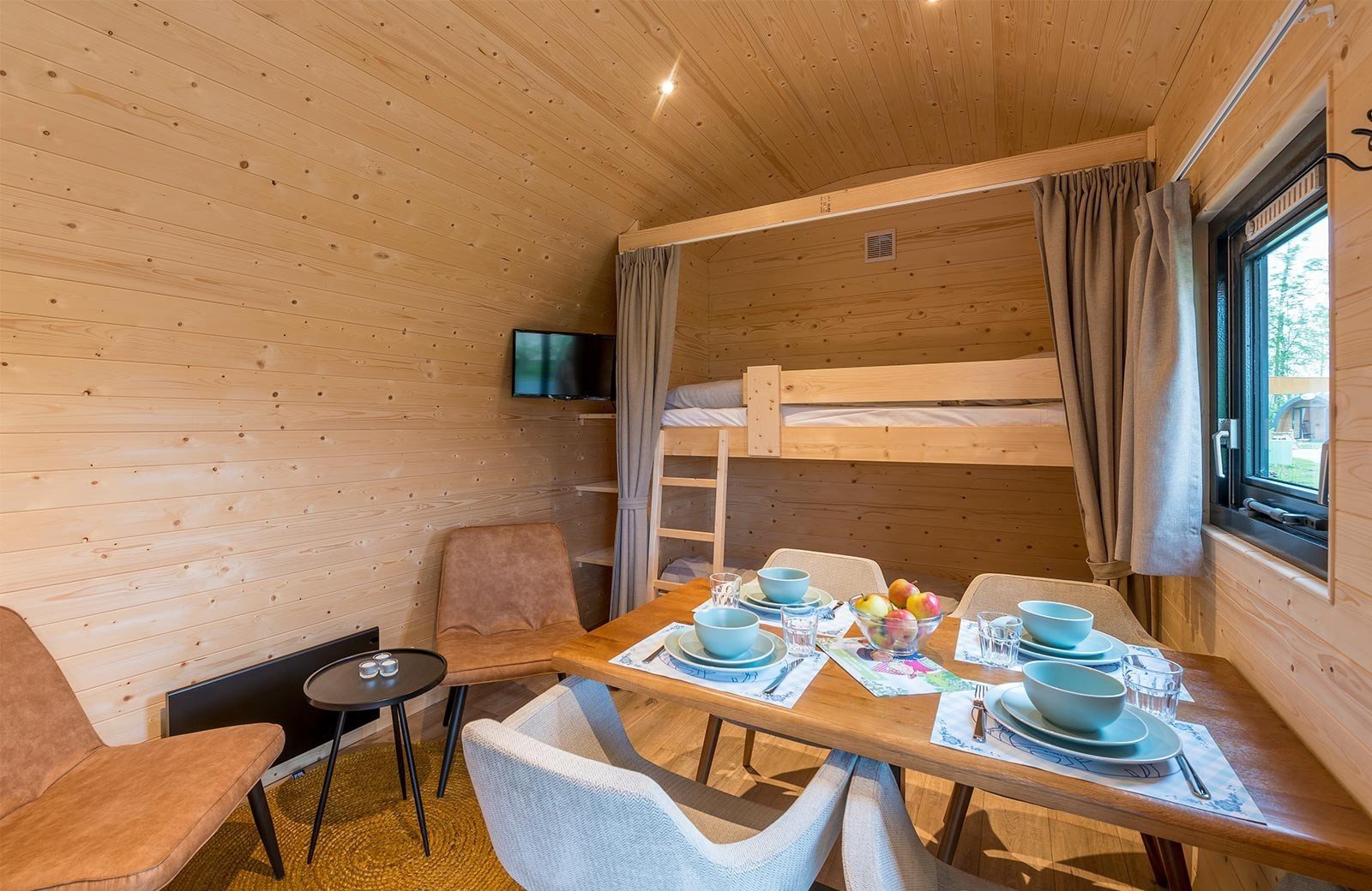 Polderlodge woonkamer slaapkamer 4 personen